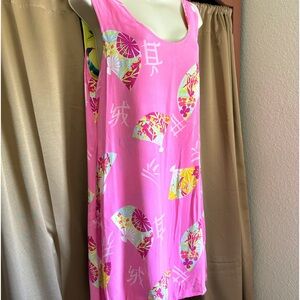 Cute sundress, above knees, hangs well. Nice for summer bbq or outing
